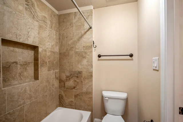 a bathroom with a sink and shower
