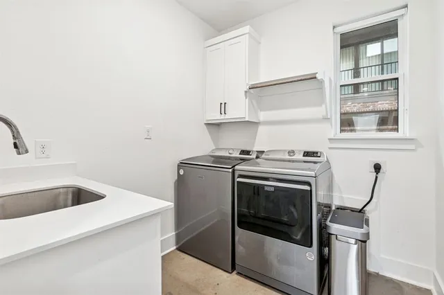 a kitchen with a stove and a sink