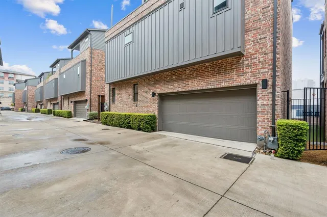 a view of a street with brick building in front of it