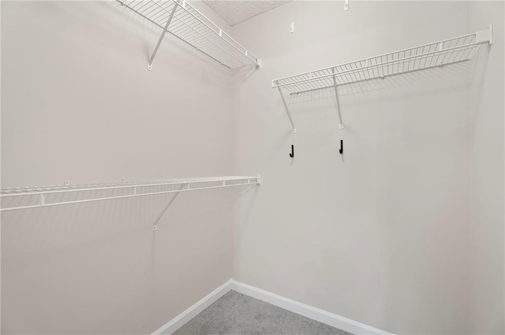 6854 John West Road Winston, GA 30187 - Photo 11 of 46 a view of a room with racks on the wall