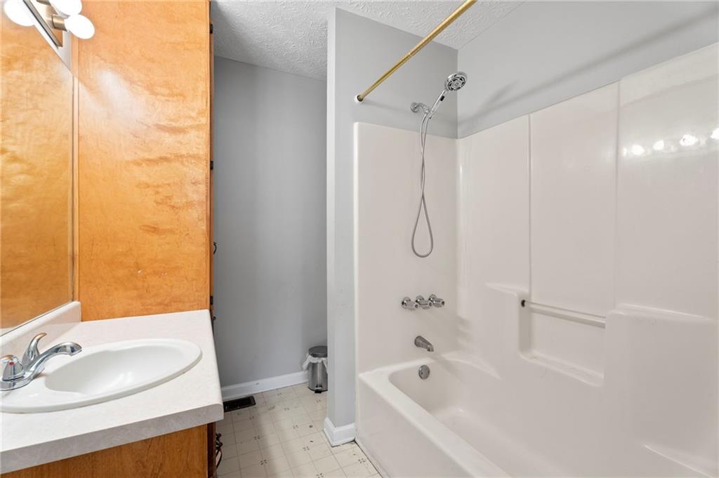 6854 John West Road Winston, GA 30187 - Photo 12 of 46 a bathroom with a sink and a mirror