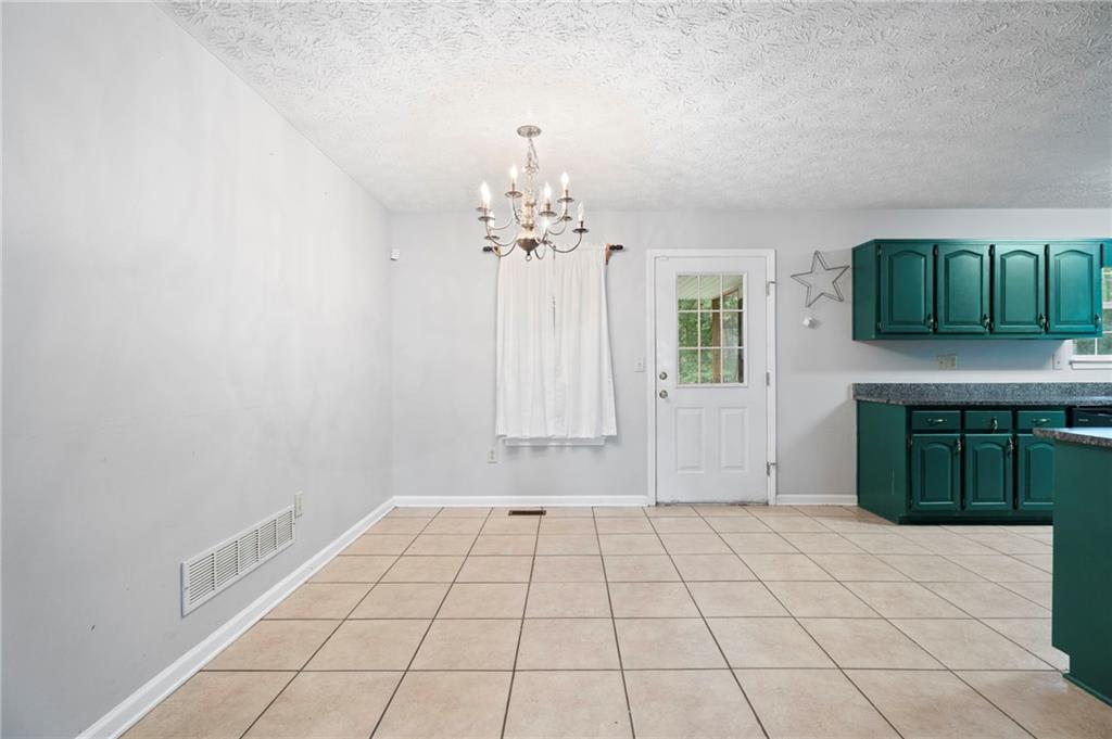 6854 John West Road Winston, GA 30187 - Photo 14 of 46 a view of a utility room with a window