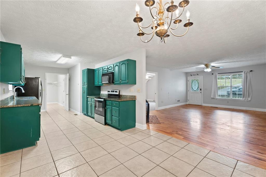 6854 John West Road Winston, GA 30187 - Photo 15 of 46 a view of a kitchen with a sink furniture and a kitchen view
