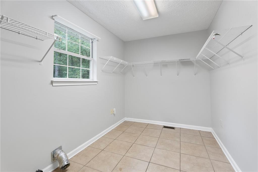 6854 John West Road Winston, GA 30187 - Photo 19 of 46 an empty room with windows