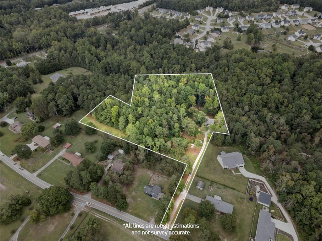 6854 John West Road Winston, GA 30187 - Photo 42 of 46 an aerial view of a residential houses with yard