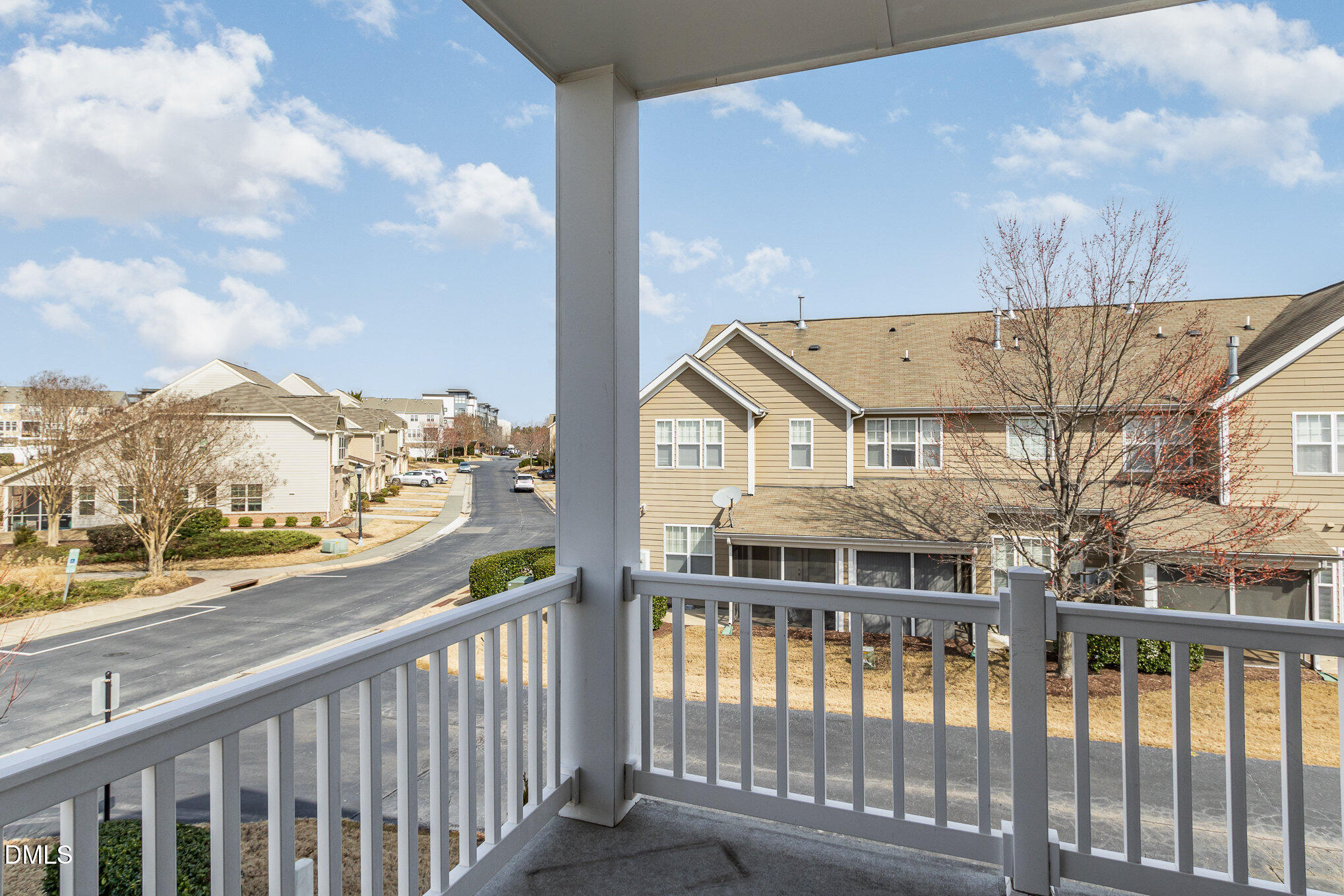 9142 Falkwood Road Raleigh, NC 27617 - Photo 16 of 33 a view of a building from a balcony