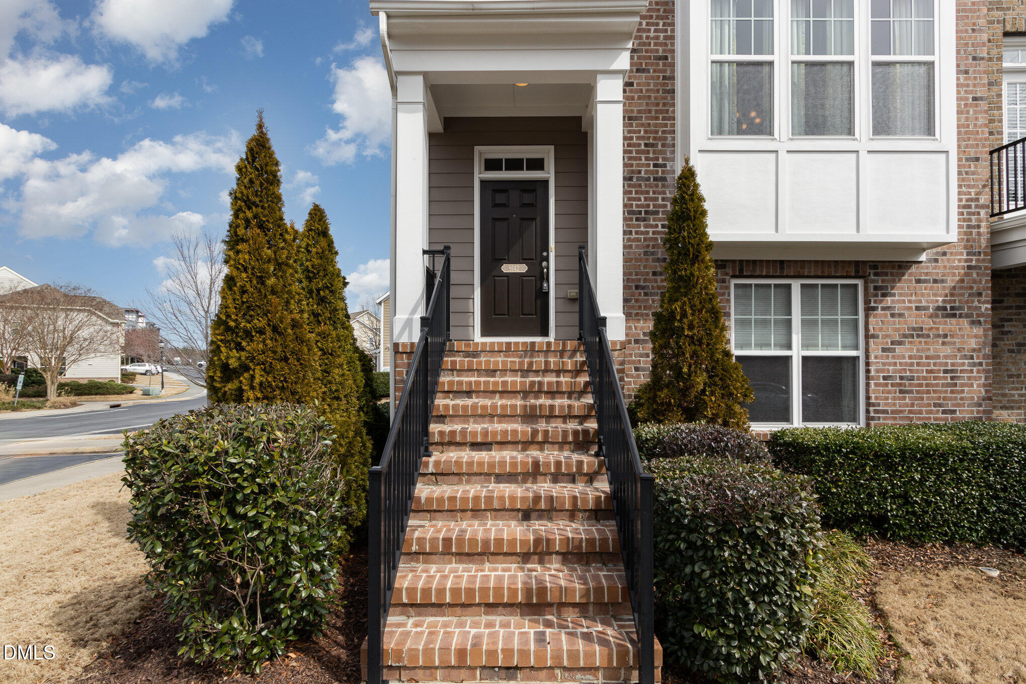 9142 Falkwood Road Raleigh, NC 27617 - Photo 2 of 33 front view of a brick house with a yard