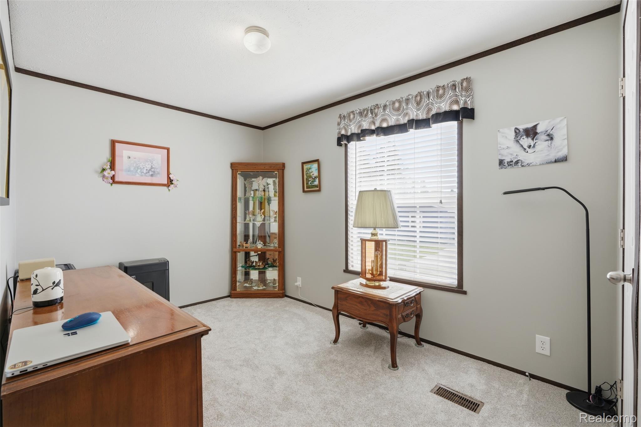 440 Flamingo Street Rochester, MI 48309 - Photo 22 of 32 Office space featuring light carpet and ornamental molding