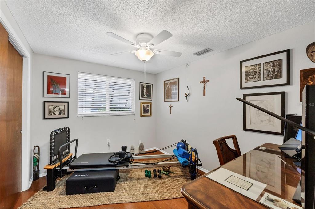 1456 Strada D Argento Venice, FL 34292 - Photo 22 of 47 a room with furniture and ceiling fan