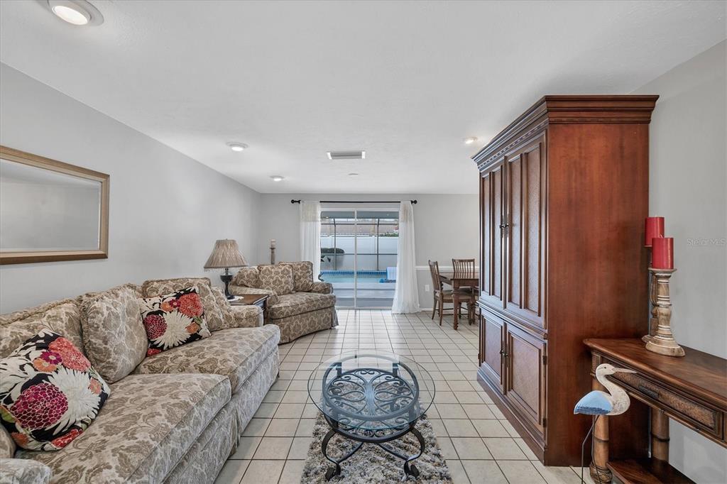 1456 Strada D Argento Venice, FL 34292 - Photo 8 of 47 a living room with furniture and a flat screen tv