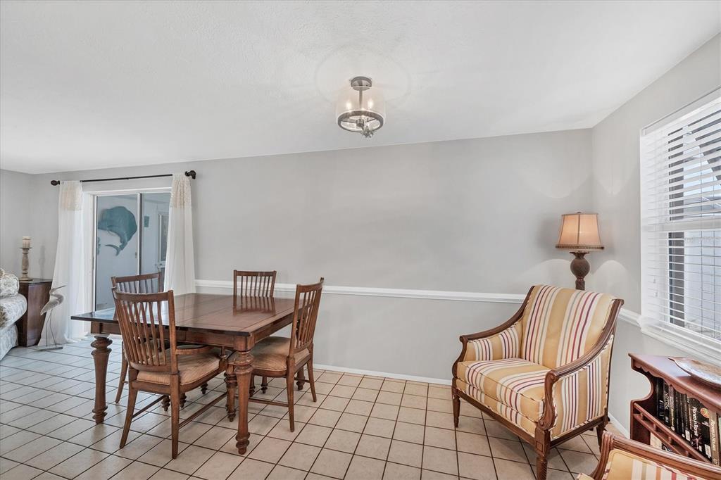 1456 Strada D Argento Venice, FL 34292 - Photo 10 of 47 a view of a livingroom with furniture and lounge chair