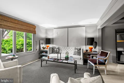 a bedroom with a bed and a fireplace