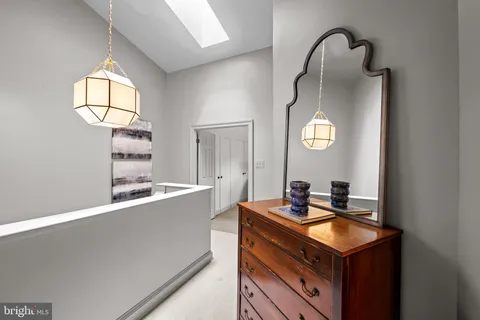 a view of a livingroom with shelves