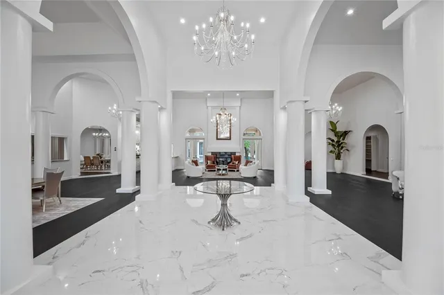 a bathroom with a sink and mirror with toilet