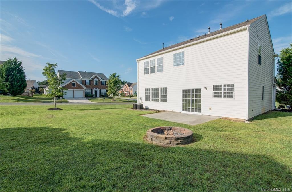 2413 Coltsgate Road Waxhaw, NC 28173 - Photo 23 of 24 a view of a house with backyard