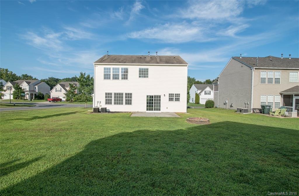 2413 Coltsgate Road Waxhaw, NC 28173 - Photo 24 of 24 a view of a house with a yard