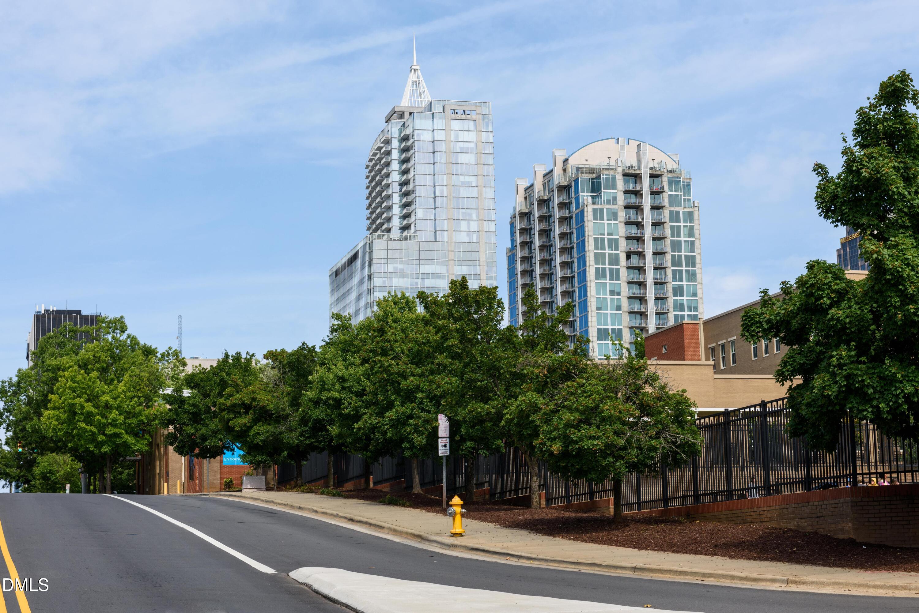 3102 Bomore Road Raleigh, NC 27610 - Photo 30 of 38 a view of a city with tall buildings