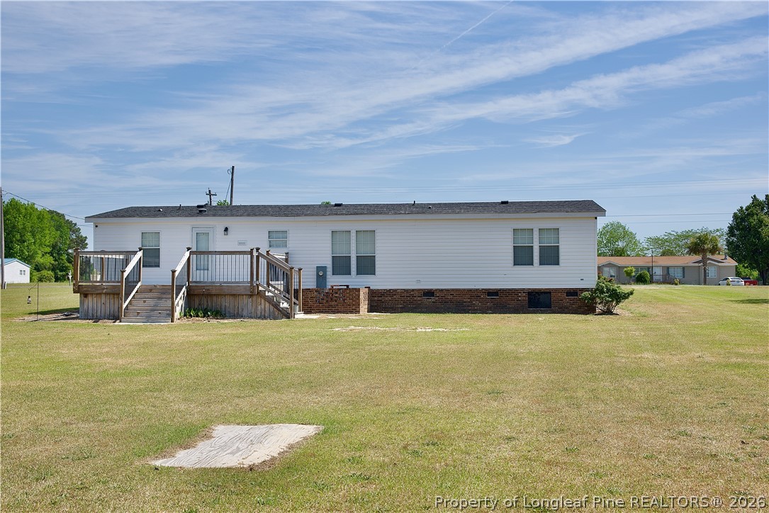1071 Watts Road Lumberton, NC 28360 - Photo 31 of 31 a view of a house with swimming pool