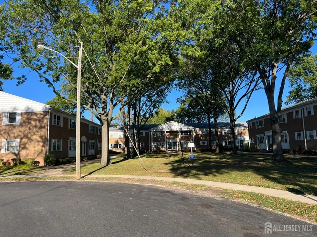 a view of a building with trees