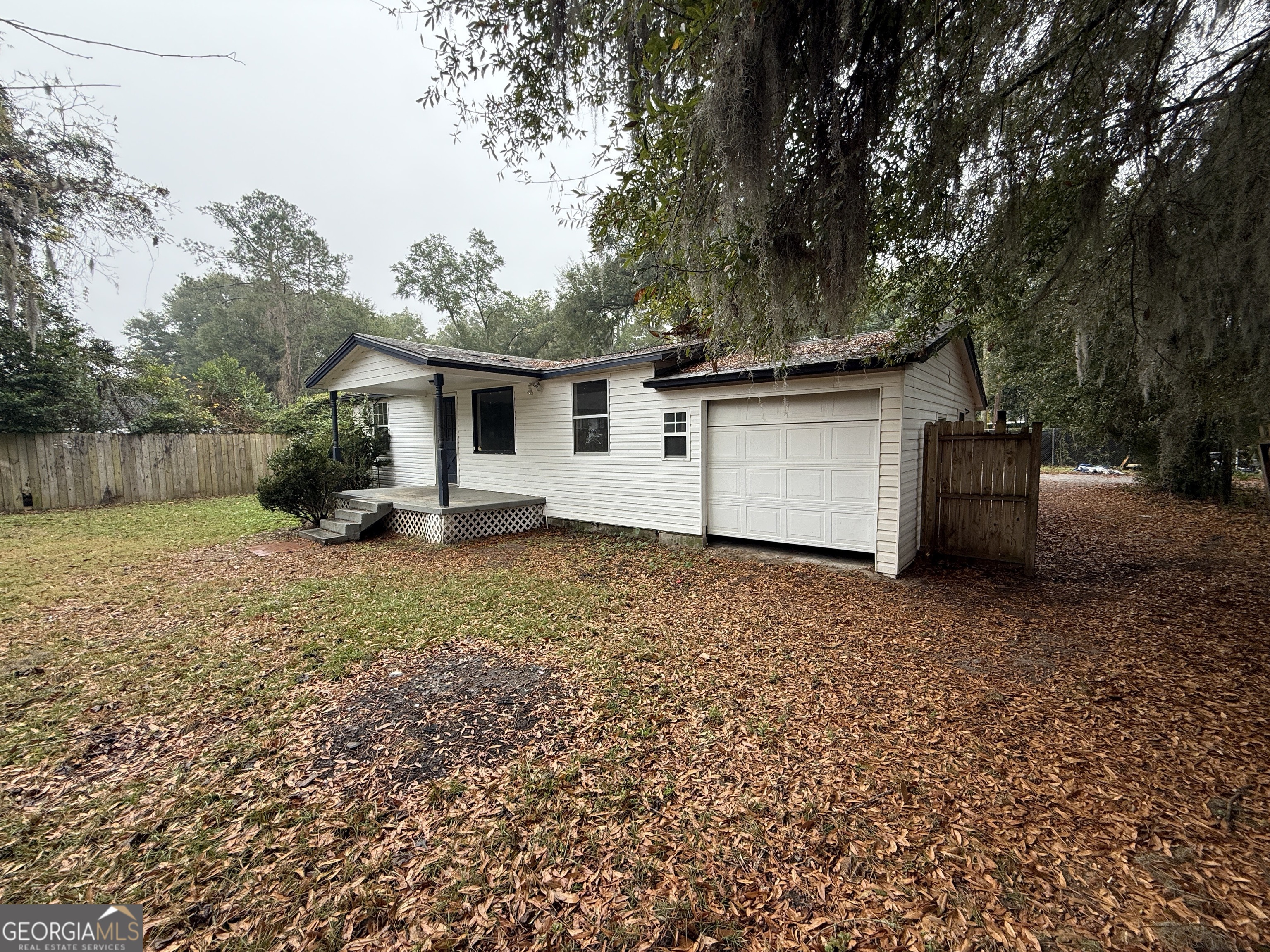 316 Edgewater Road Savannah, GA 31406 - Photo 5 of 13 front view of a house with a yard
