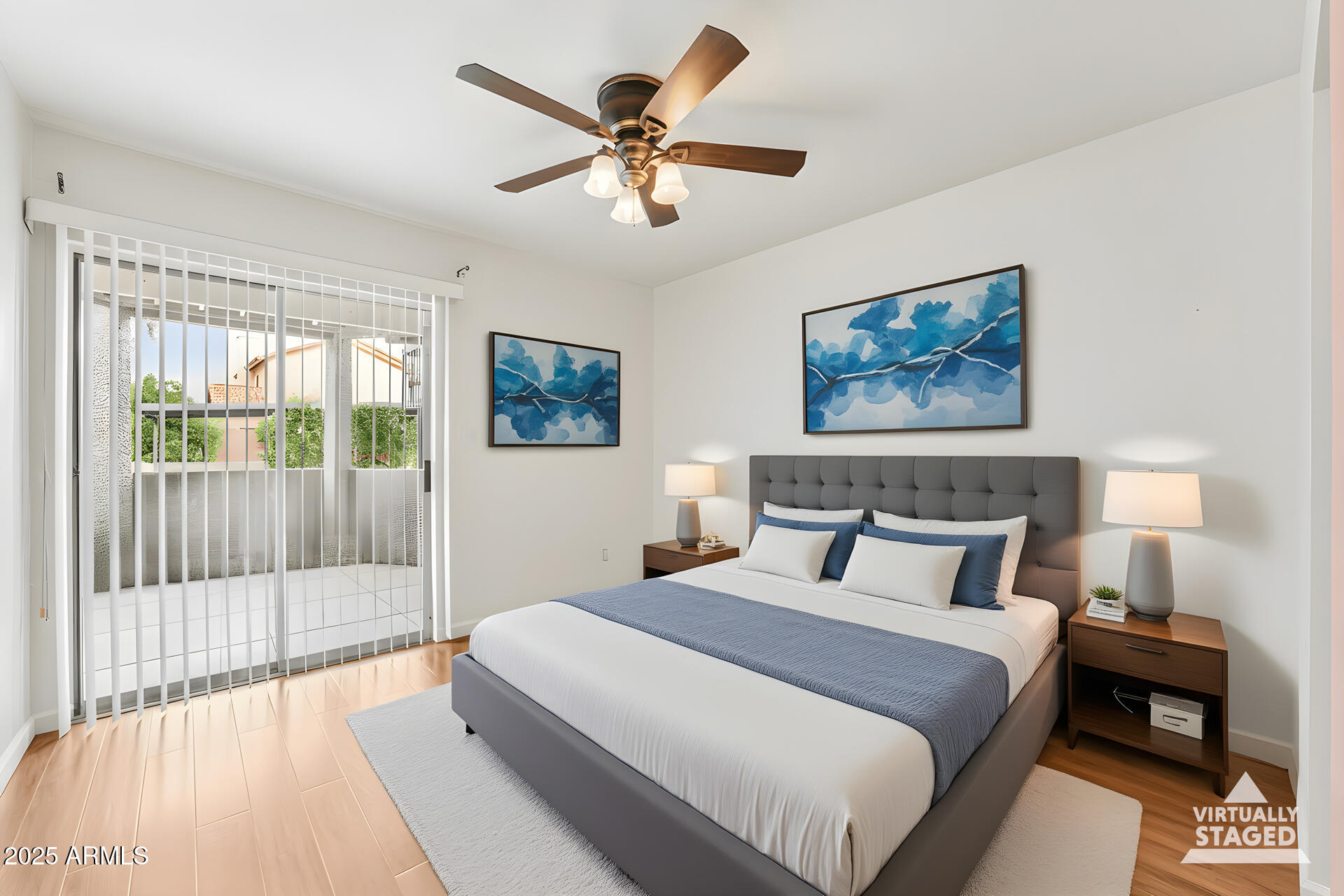 1720 East Thunderbird Road, Unit 1070 Phoenix, AZ 85022 - Photo 12 of 19 a bedroom with a large bed and a chandelier