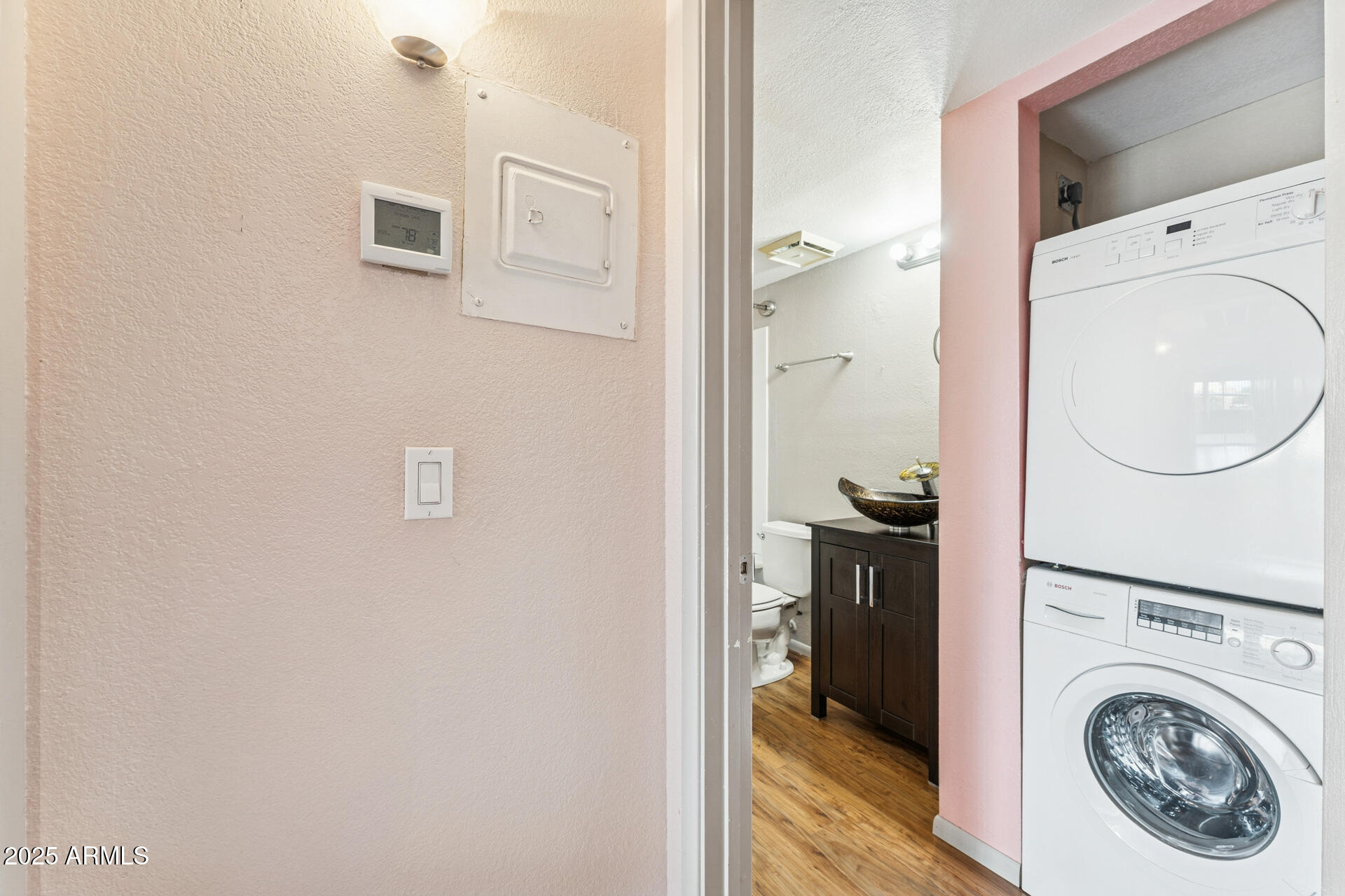 1720 East Thunderbird Road, Unit 1070 Phoenix, AZ 85022 - Photo 16 of 19 a view of a hallway with washer and dryer