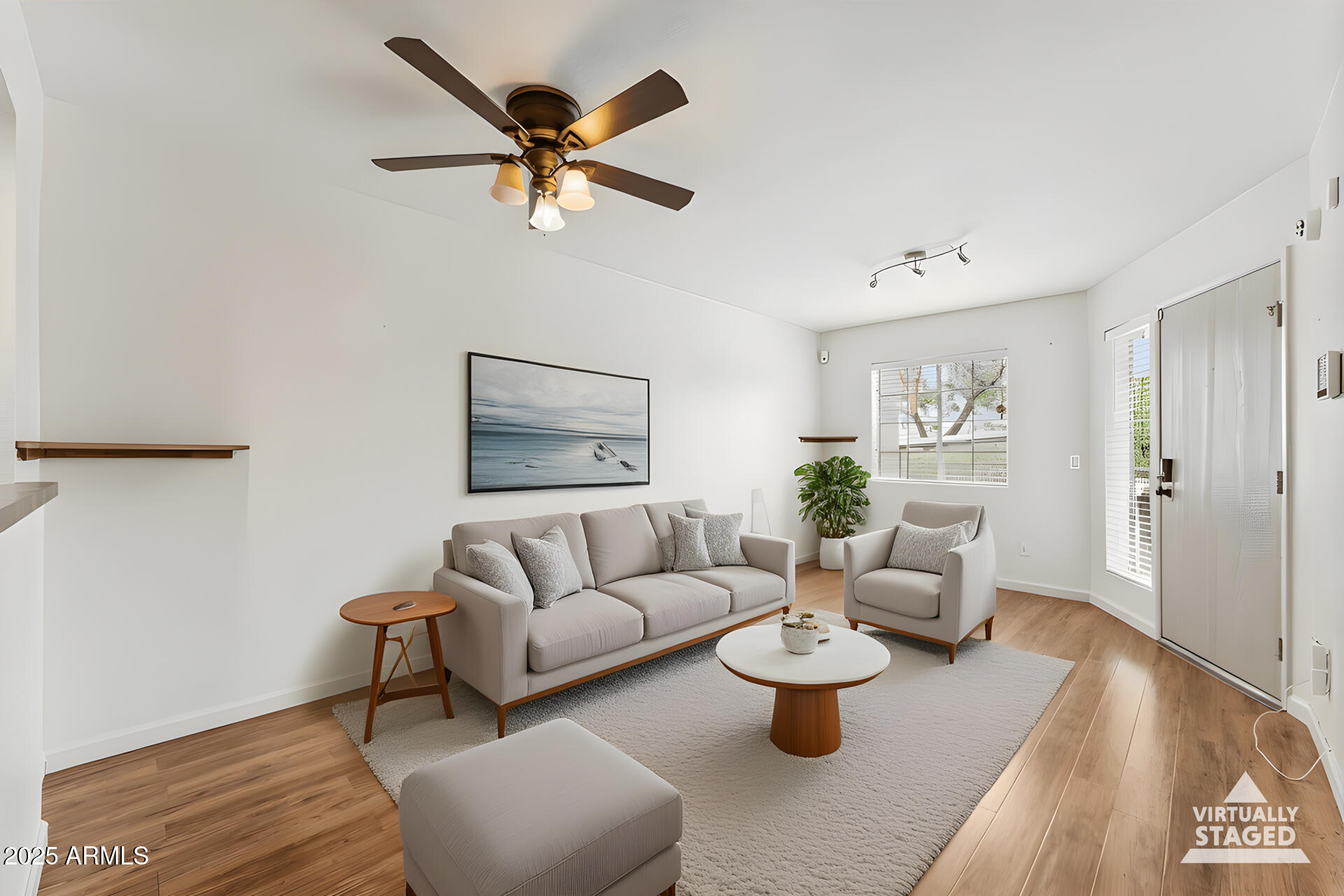 1720 East Thunderbird Road, Unit 1070 Phoenix, AZ 85022 - Photo 4 of 19 a living room with furniture and a wooden floor