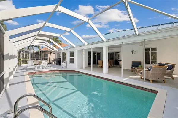 a view of a house with swimming pool