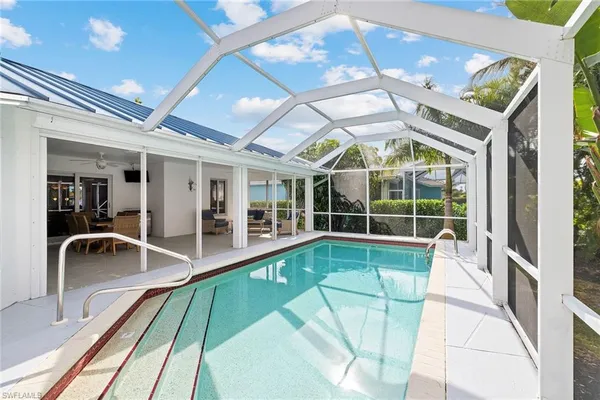 a view of a kitchen with a swimming pool