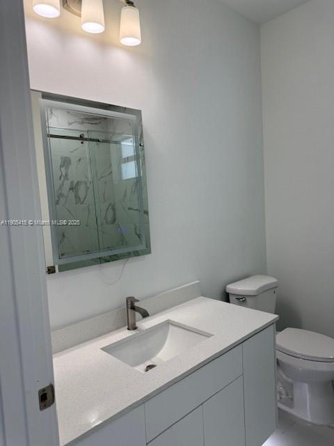 617 Valley Avenue Lehigh Acres, FL 33974 - Photo 20 of 46 a bathroom with a sink and a toilet