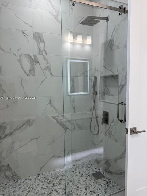 617 Valley Avenue Lehigh Acres, FL 33974 - Photo 22 of 46 a bathroom with a shower