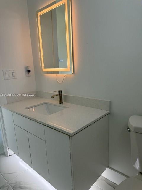 617 Valley Avenue Lehigh Acres, FL 33974 - Photo 24 of 46 a bathroom with a sink and a toilet
