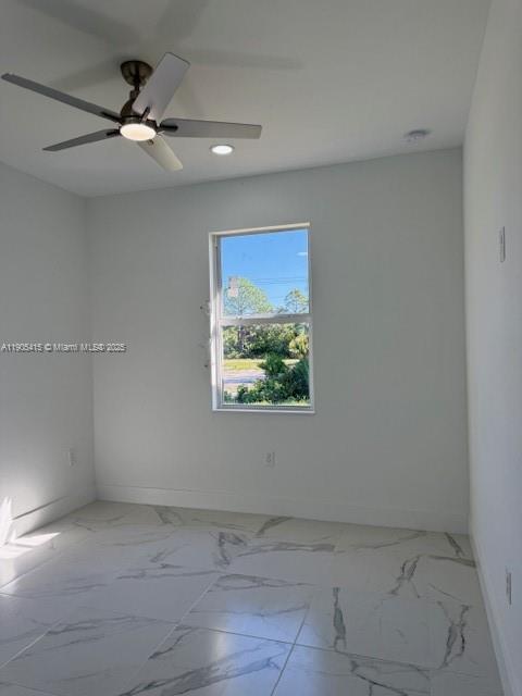 617 Valley Avenue Lehigh Acres, FL 33974 - Photo 25 of 46 a view of an empty room with a window