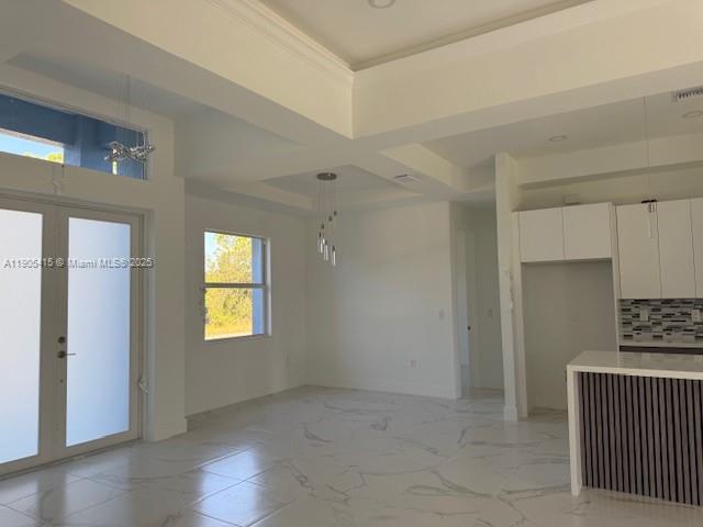 617 Valley Avenue Lehigh Acres, FL 33974 - Photo 6 of 46 an empty room with windows