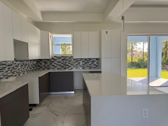 617 Valley Avenue Lehigh Acres, FL 33974 - Photo 10 of 46 a bathroom with a sink and a bathtub