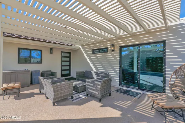 a outdoor living space with furniture and garden view