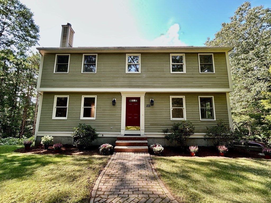 275 Burroughs Road Boxborough, MA 01719 - Photo 2 of 23 a front view of house with yard