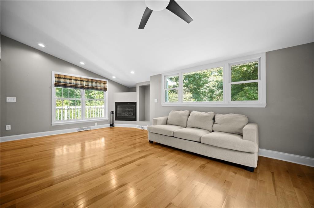 371 Highland Road Pittsburgh, PA 15235 - Photo 22 of 50 a living room with furniture and a large window