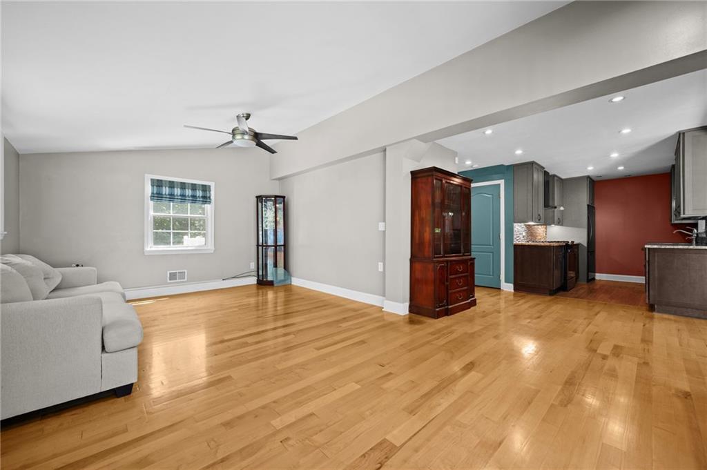 371 Highland Road Pittsburgh, PA 15235 - Photo 24 of 50 a view of a livingroom with a furniture and window