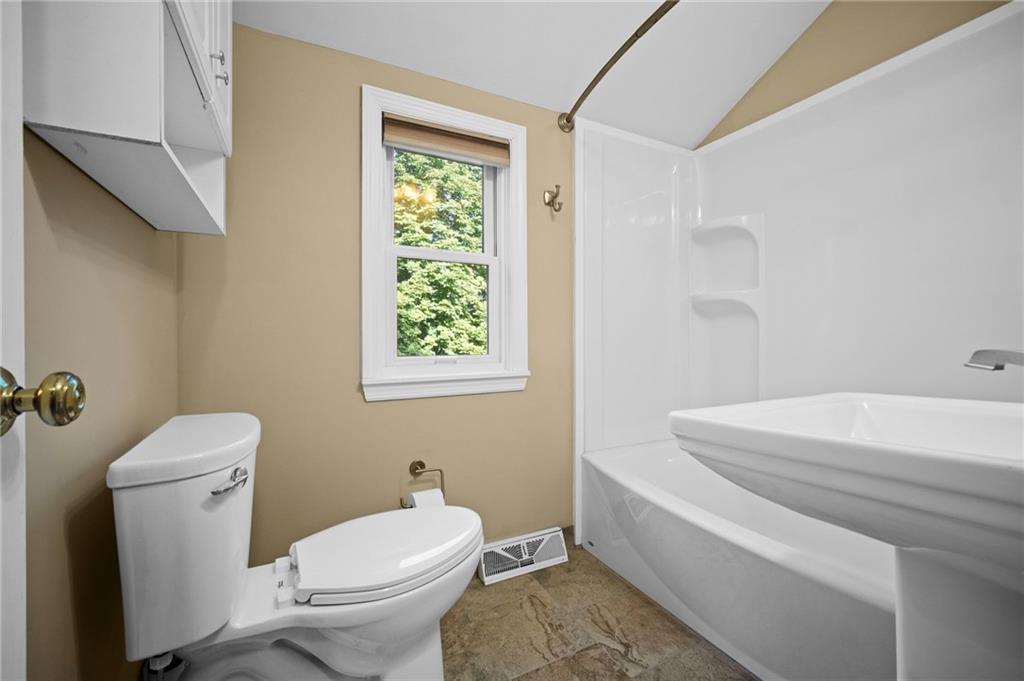371 Highland Road Pittsburgh, PA 15235 - Photo 27 of 50 a bathroom with a sink toilet and window