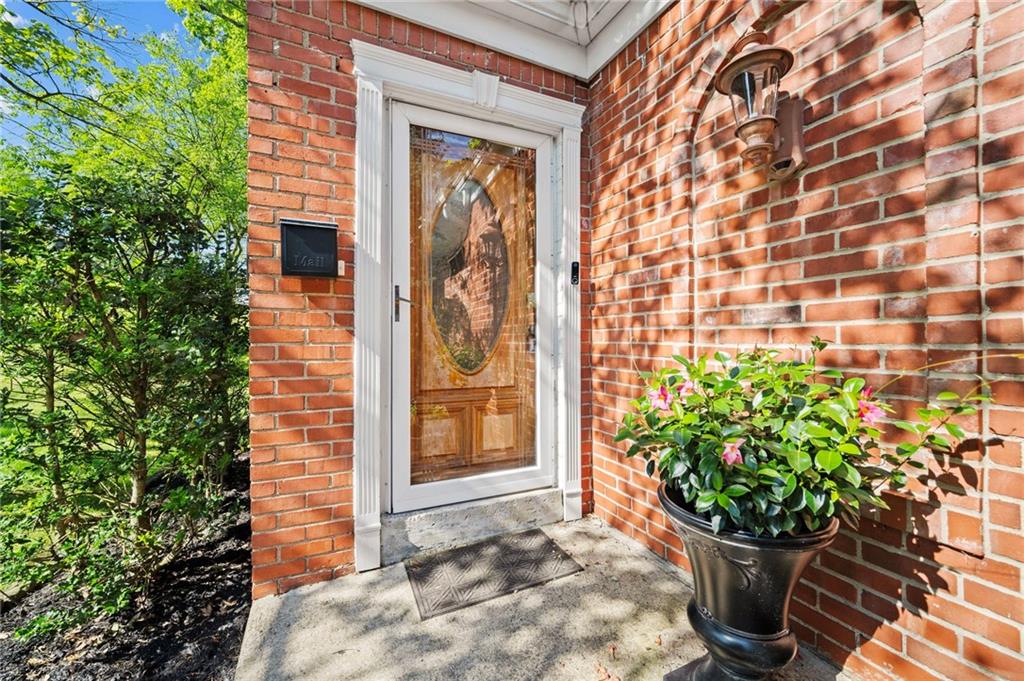 371 Highland Road Pittsburgh, PA 15235 - Photo 4 of 50 a view of a potted plants in front of a door