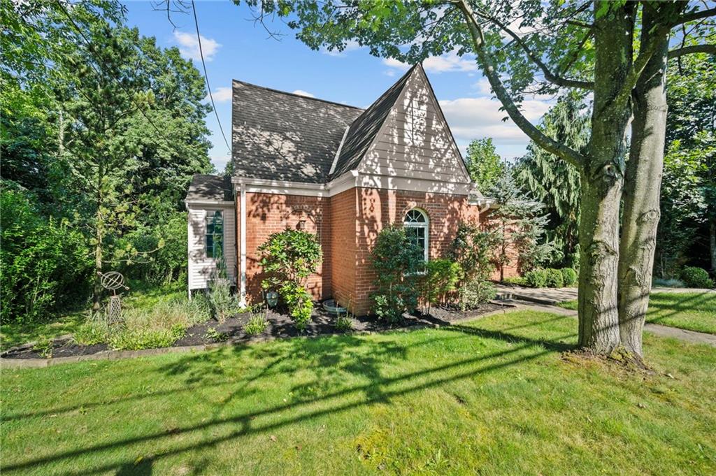 371 Highland Road Pittsburgh, PA 15235 - Photo 44 of 50 a view of a house with backyard and garden