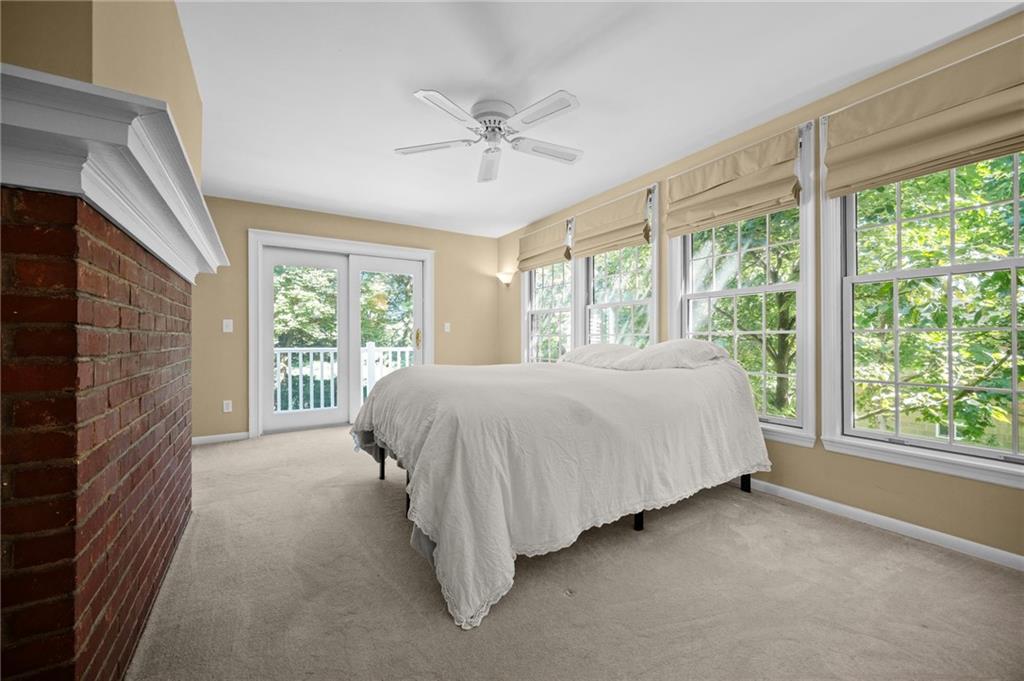 371 Highland Road Pittsburgh, PA 15235 - Photo 8 of 50 a bed sitting in a room next to a window