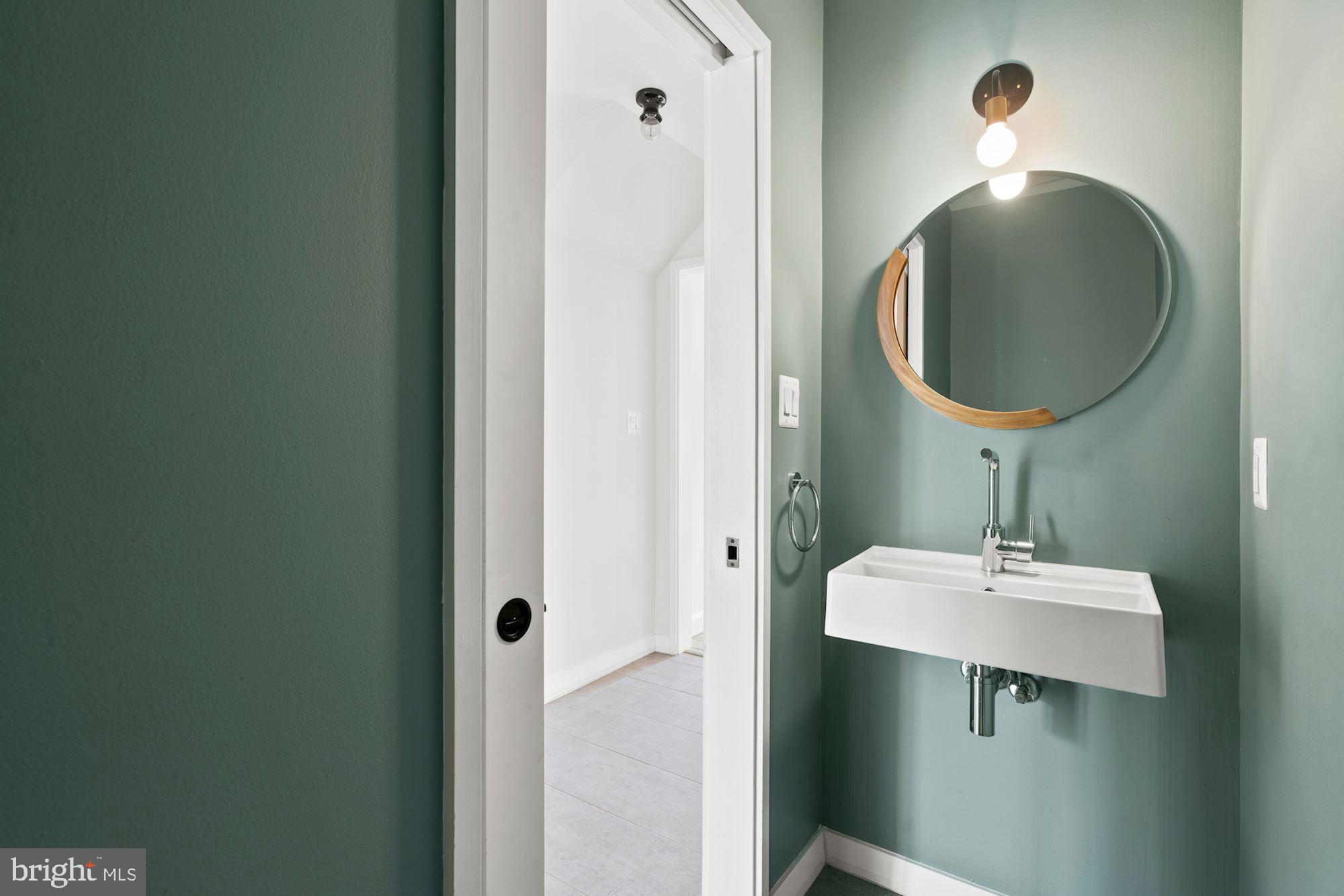 4823 Alton Place Northwest Washington, DC 20016 - Photo 23 of 49 Main Level Powder Room