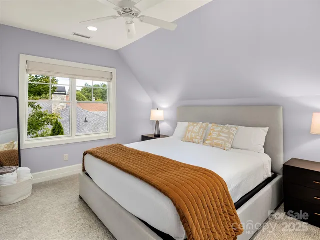 a bathroom with a toilet sink and shower