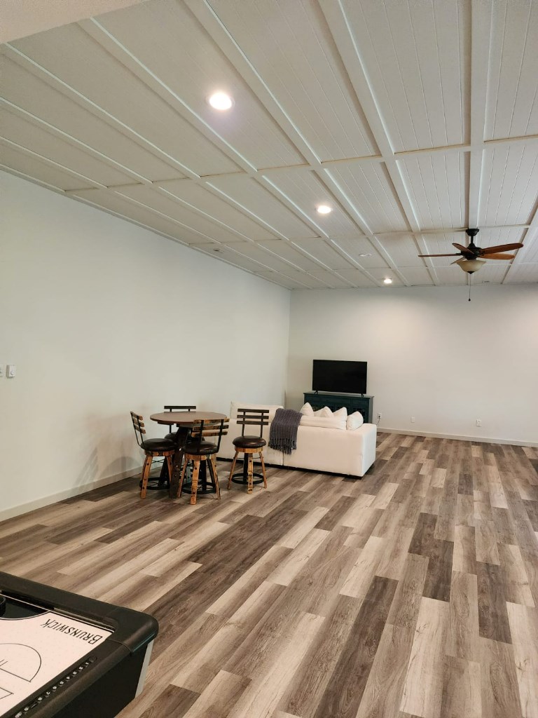 411 Delta Way Blue Ridge, GA 30513 - Photo 23 of 35 a room with table and chairs