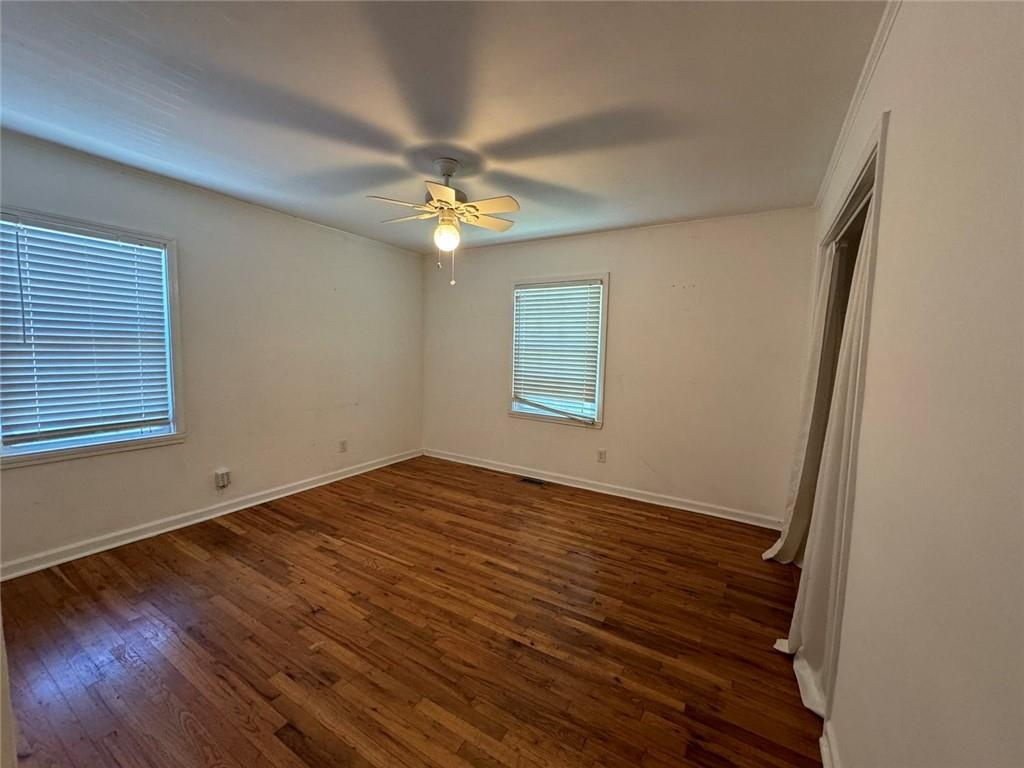 190 Cleveland Street Southeast Atlanta, GA 30316 - Photo 18 of 31 a view of empty room with wooden floor and fan