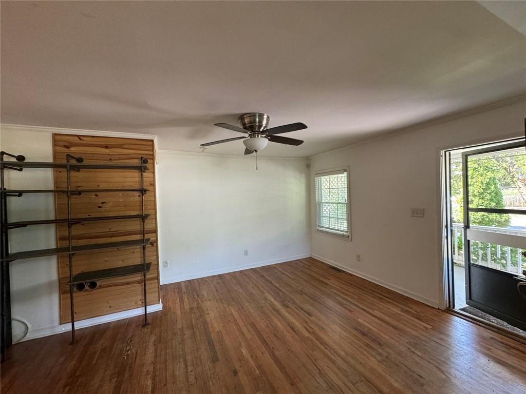 190 Cleveland Street Southeast Atlanta, GA 30316 - Photo 9 of 31 a view of empty room with wooden floor and fan