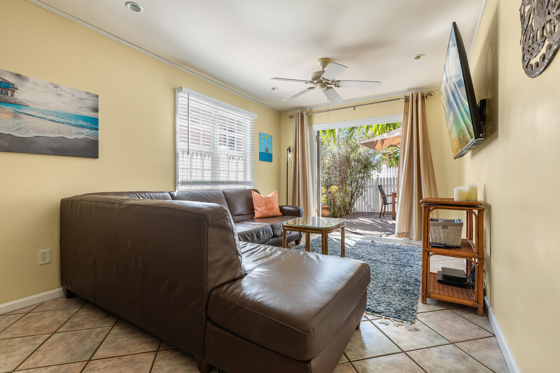 620 Thomas Street, Unit 175 Key West, FL 33040 - Photo 14 of 30 a living room with furniture and a flat screen tv