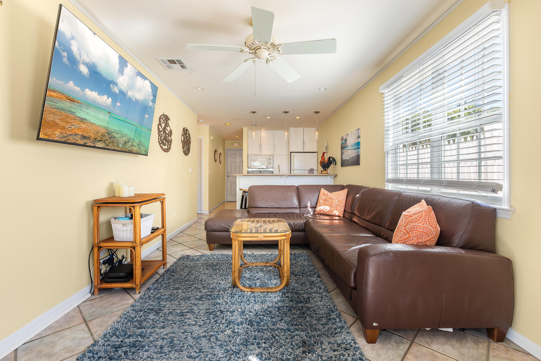 620 Thomas Street, Unit 175 Key West, FL 33040 - Photo 22 of 30 a living room with furniture and a window